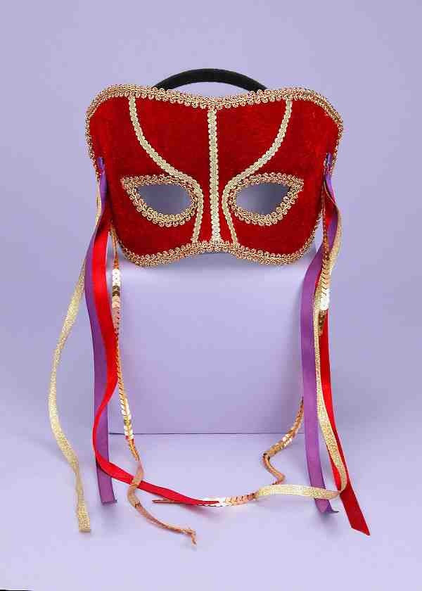 A red and gold half masquerade mask with ribbons.