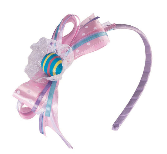 A purple and pink pastel headband with a bow and easter egg on top.