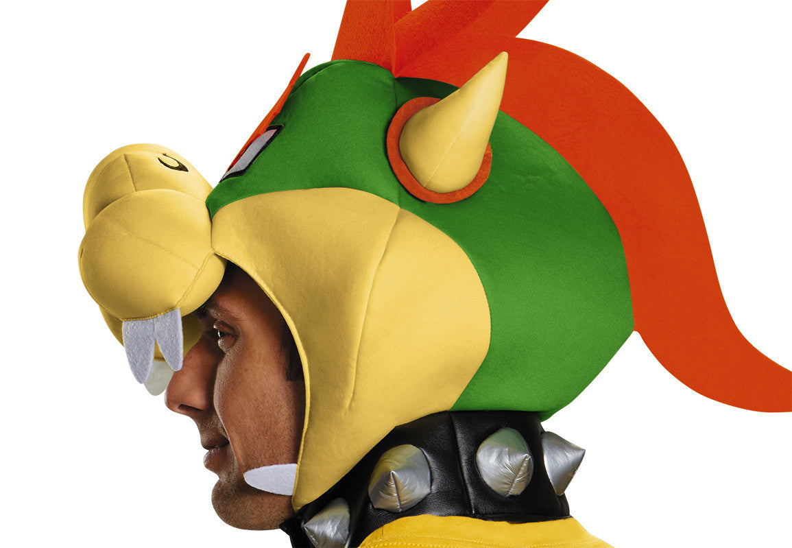 A man wearing a bowser mask for his Halloween costume.