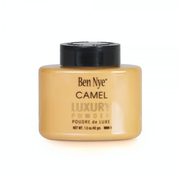 Ben Nye luxury powder in camel color product number MHV - 1 in a 1.5 oz bottle.