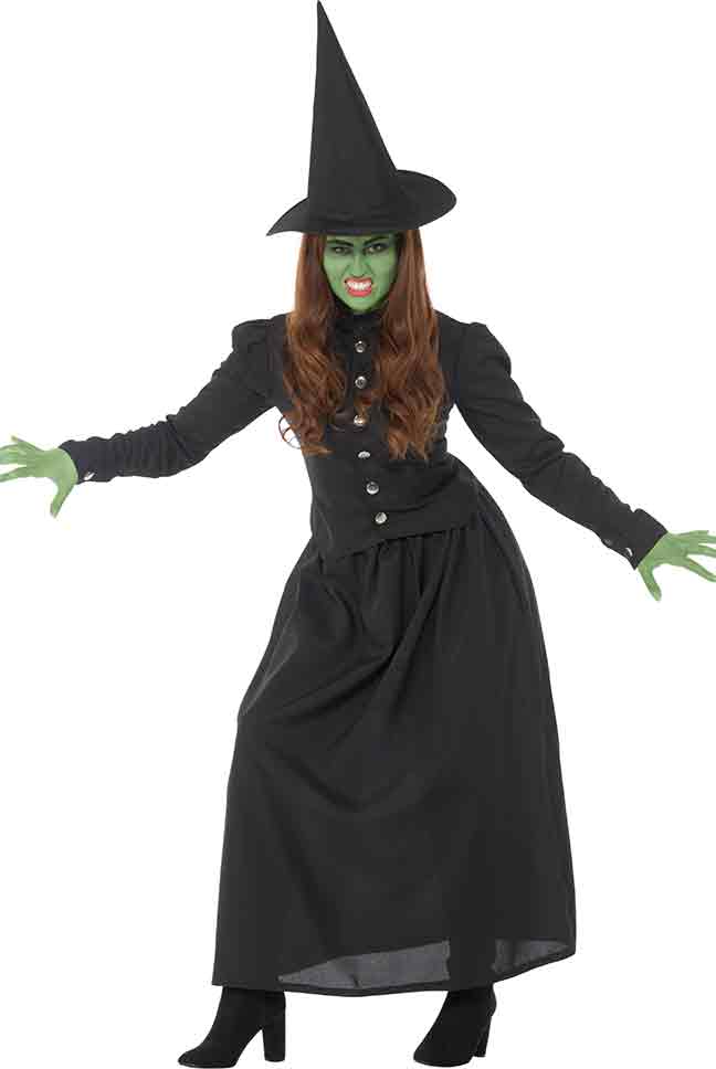 A woman wearing a wicked witch costume with a witches hat.