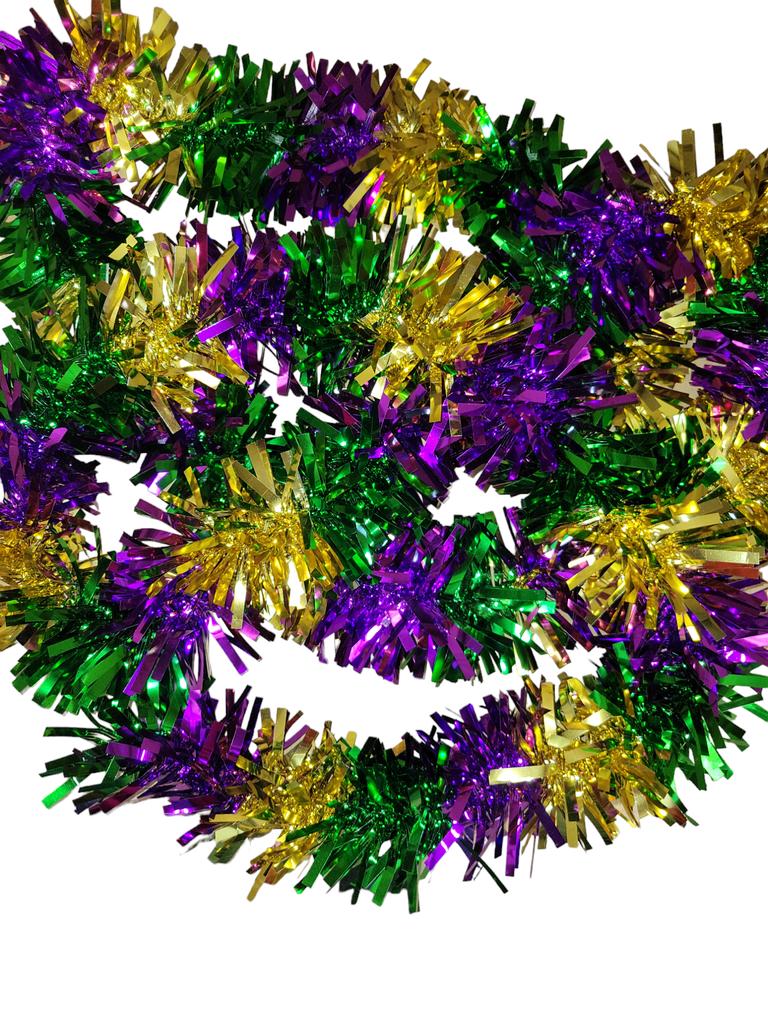 a green, gold and purple metallic mardi gras garland.