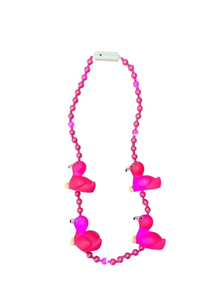 Pink flamingo light up Mardi Gras beads.