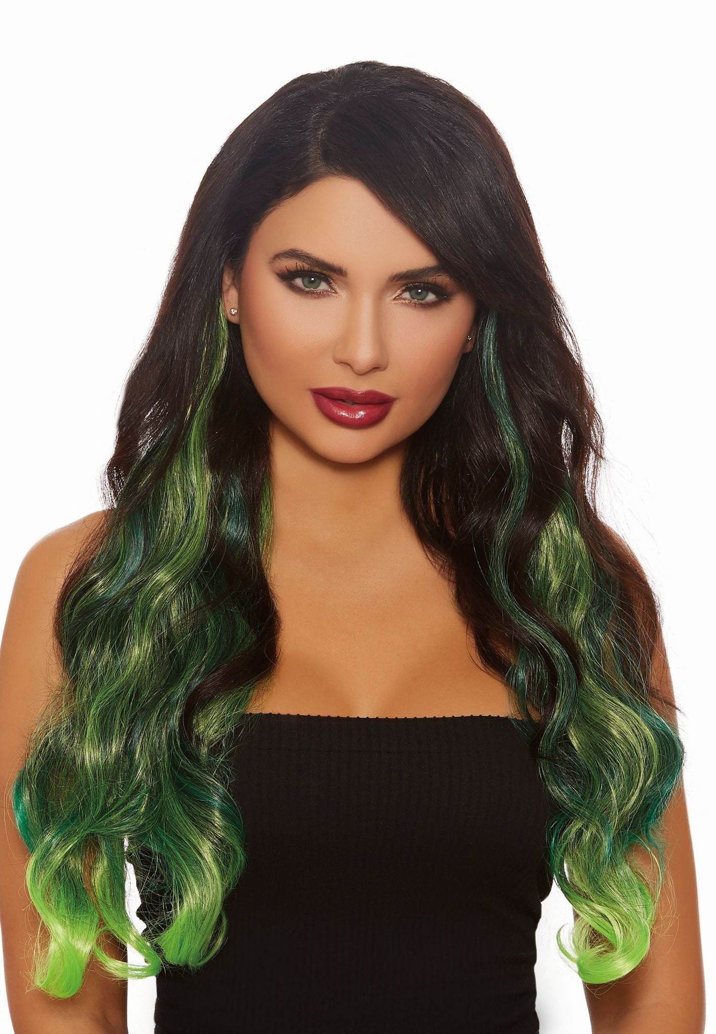A woman wearing green hair extensions.