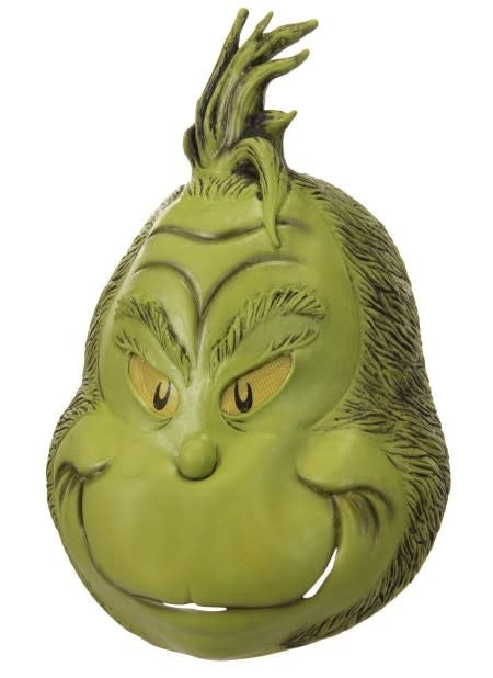 A close up of a latex Grinch Mask.