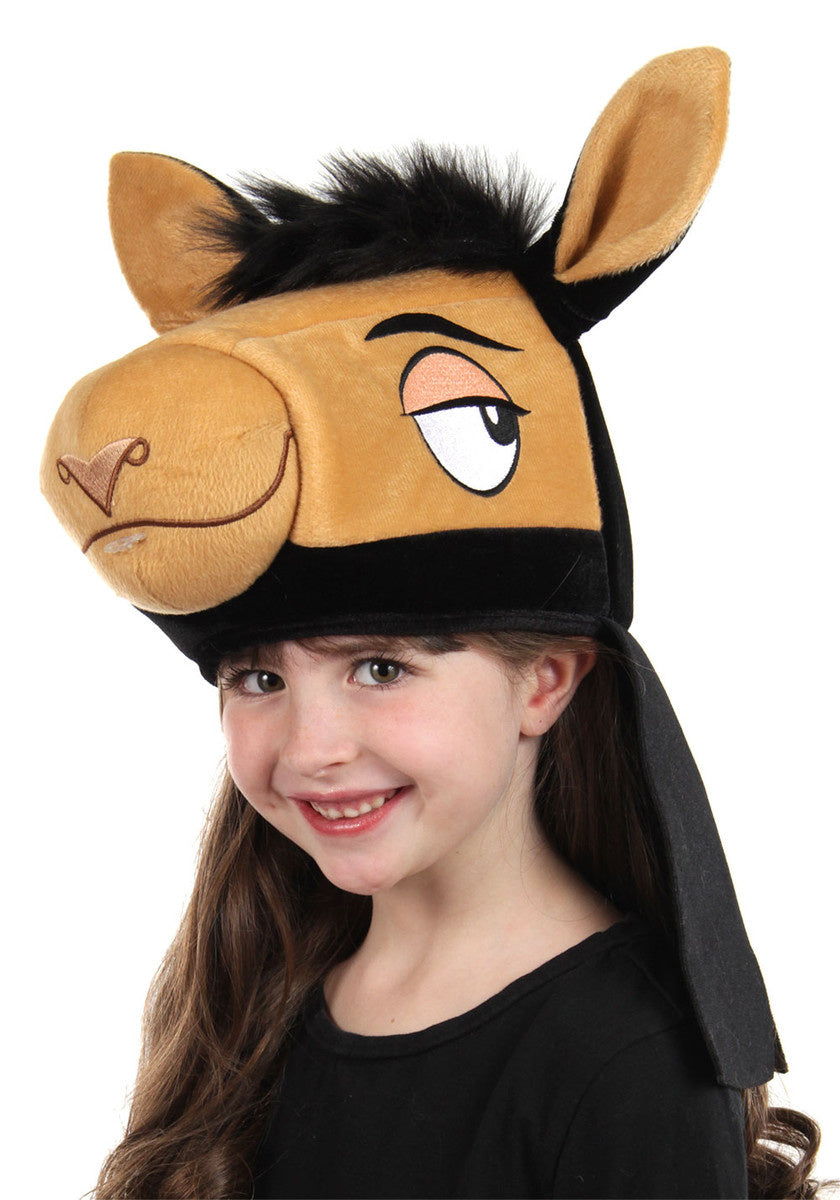 A girl wearing a Kuzco Sprazy Toy Hat from the Disney movie The Emperor's New Groove.