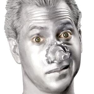 A man in silver body paint wearing the tin man nose prosthetic makeup kit.