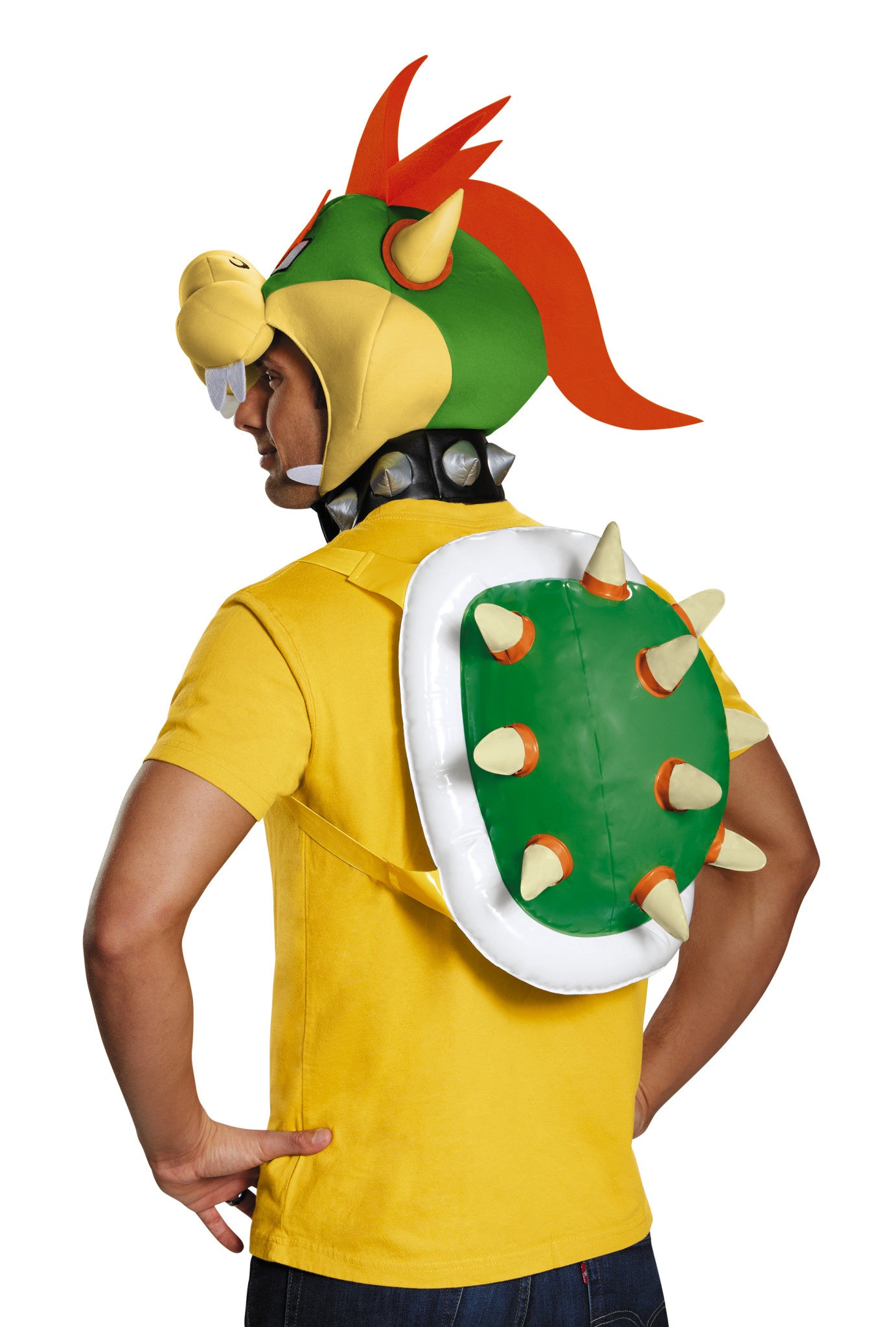 A man wearing an adult bowser costume kit.