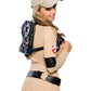 A woman turned around showing the women's Ghostbuster costume.