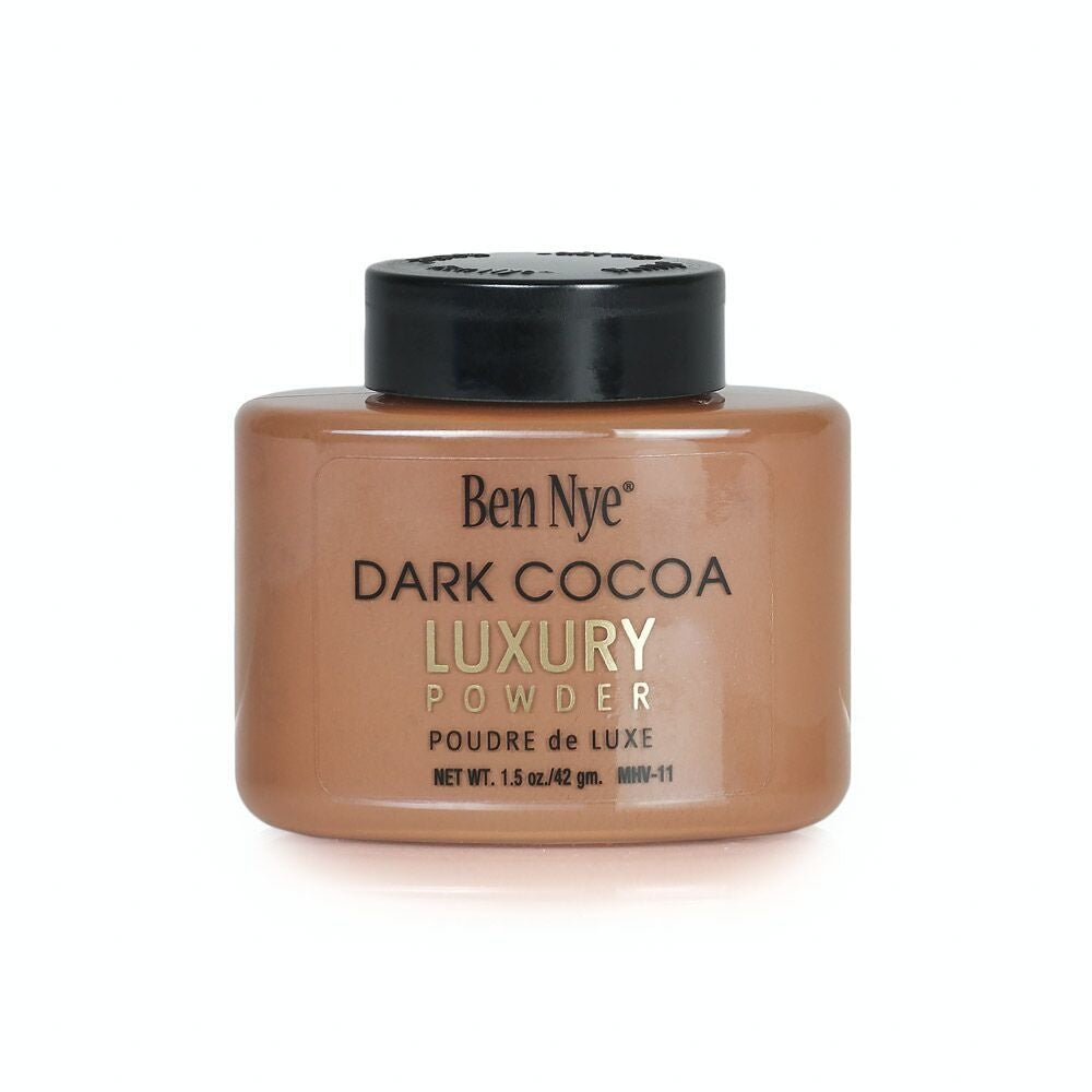 Ben Nye luxury powder in Dark cocoa color in a 1.5 oz bottle.