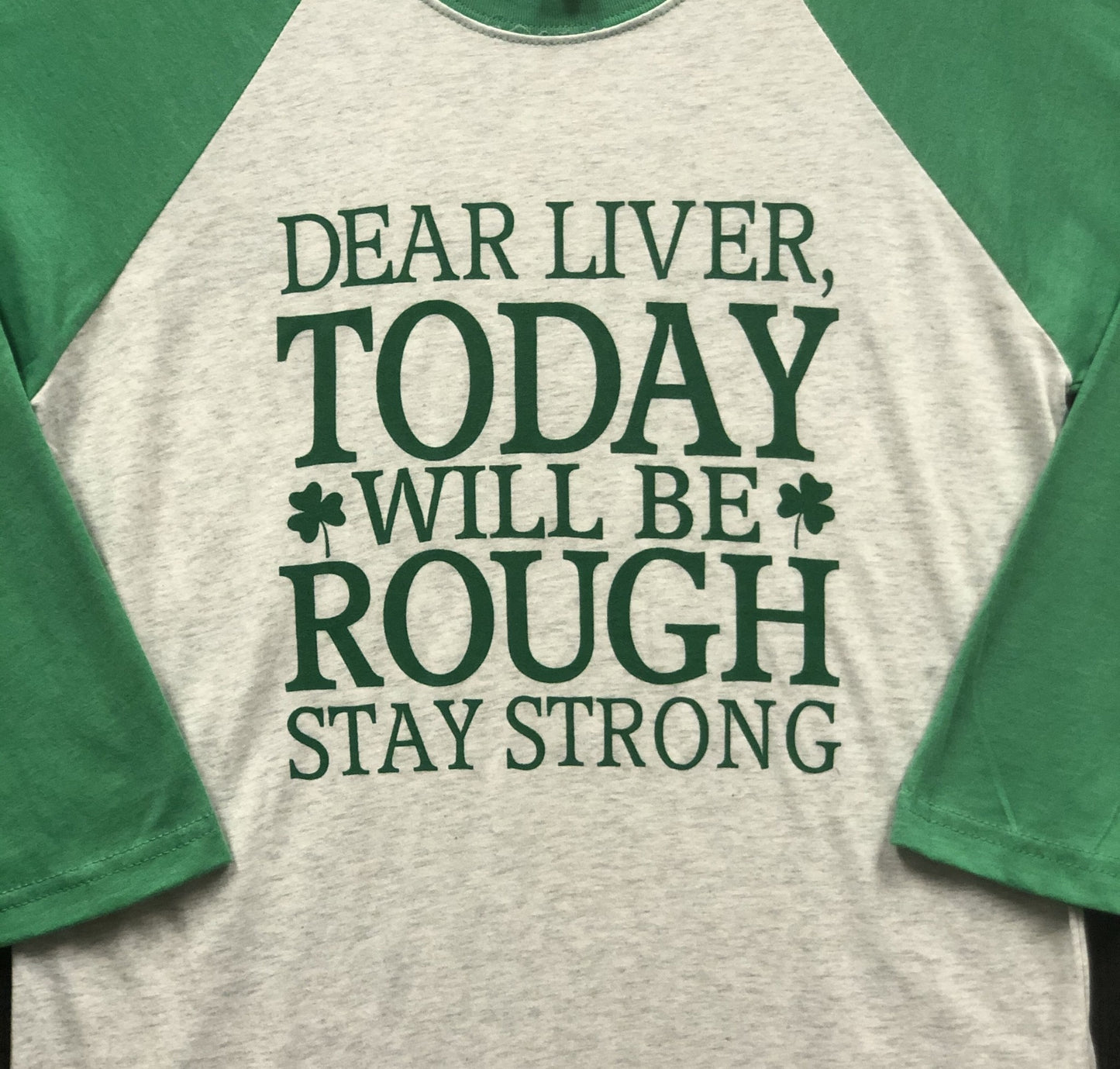 A close up of the lettering on a St. Patrick's Day baseball tee.