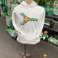 The white St. Louis St. Patrick's Day hoodie on a mannequin. 