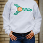 A view of the white crewneck sweatshirt for St. Patrick's Day in St. Louis. 