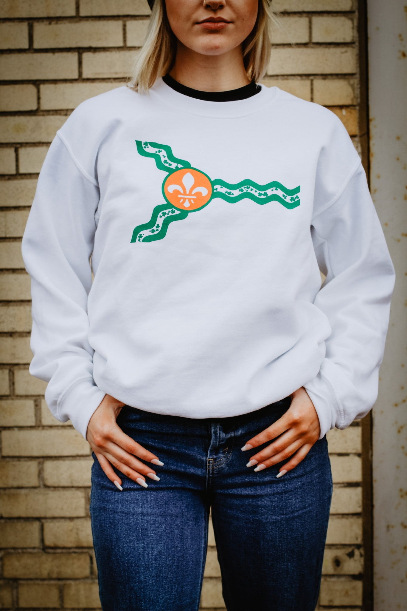 A view of the white crewneck sweatshirt for St. Patrick's Day in St. Louis. 