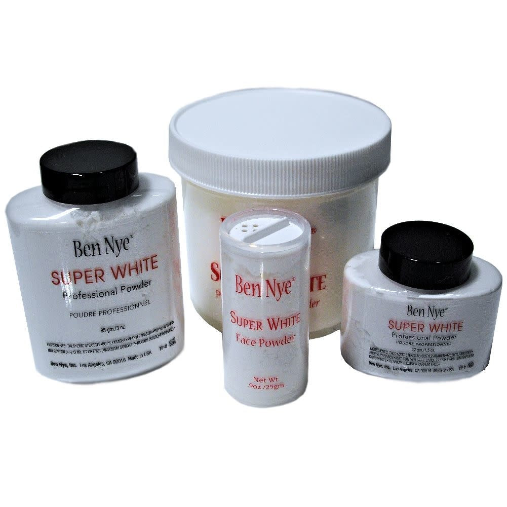 Four different sizes of Ben Nye Pro Powder in Super White.