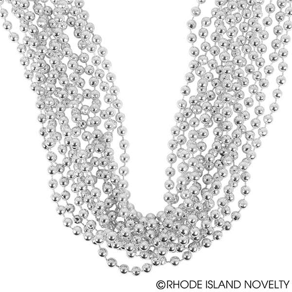 A close up of a bundle of silver beads from Rhode Island Novelty.