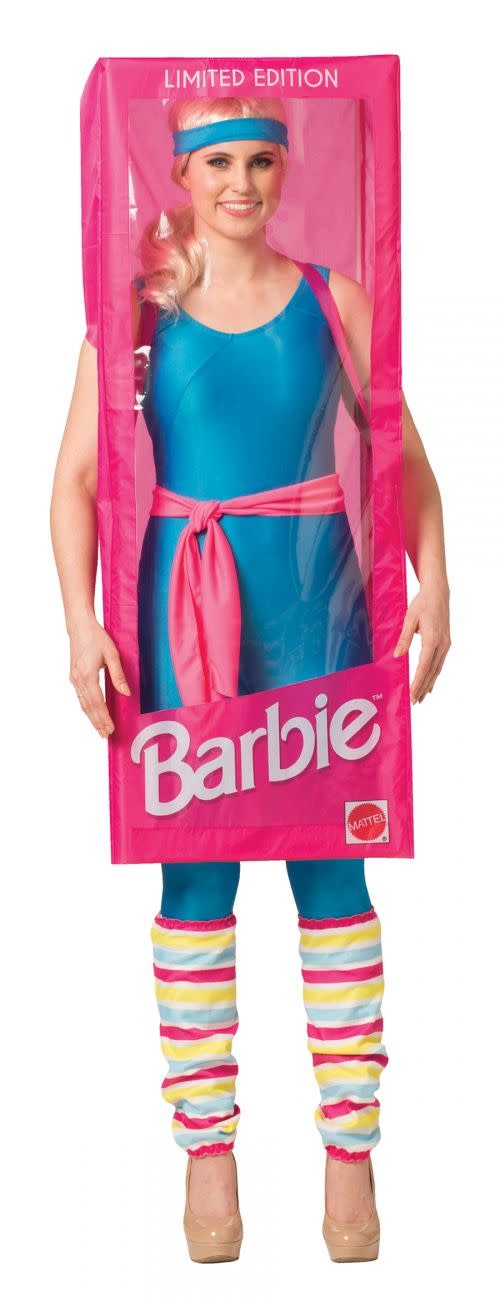 A woman wearing a Barbie Halloween Costume in the Barbie box.