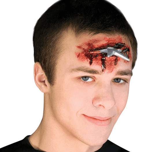 A man wearing the latex app Ninja star bleeding wound.