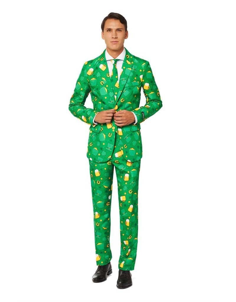 A man wearing an all green St. Patrick's Day suit.