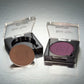 Ben Nye Pressed eyeshadow in the color brownberry.